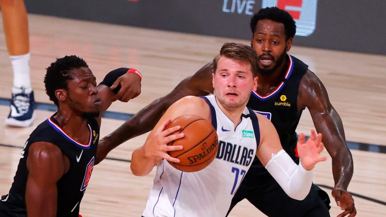 Doncic makes history but Mavericks fall to Clippers after Porzingis ejection